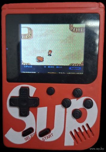 Портативная игра. С играми денди. Работает