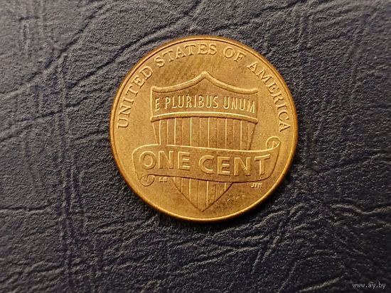 1 цент США.