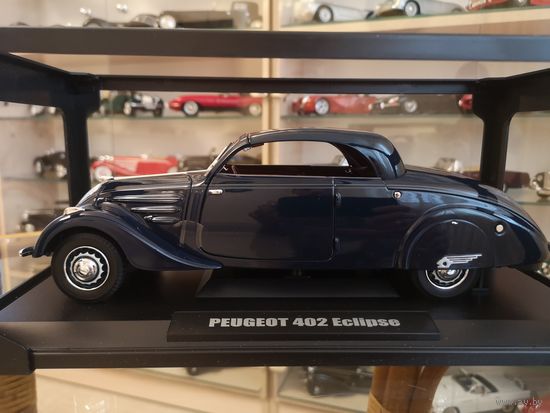 Модель 1:18 Peugeot 402 Eclipse.
