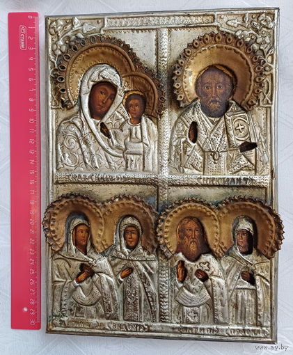 Икона четырехчастная, первая половина 19 века. Сюжеты: Казанская Богородица, Николай Чудотворец, раннехристианские святые и преподобные: Ирина и Евдокея, Антипий и Праскева. Оклад. См.описание.