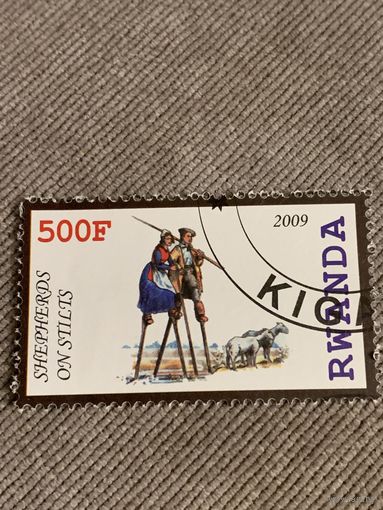 Руанда 2009. Античный транспорт. Shepherds on stilts. Марка из серии