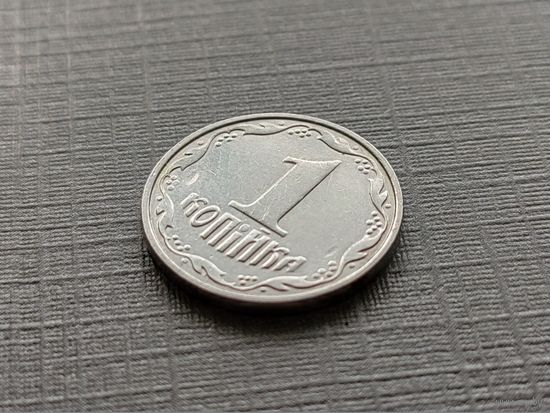 Украина. 1 копейка 2000. Брак, мини-раскол (?) штемпеля аверса, засорение штемпеля реверса. Торг.