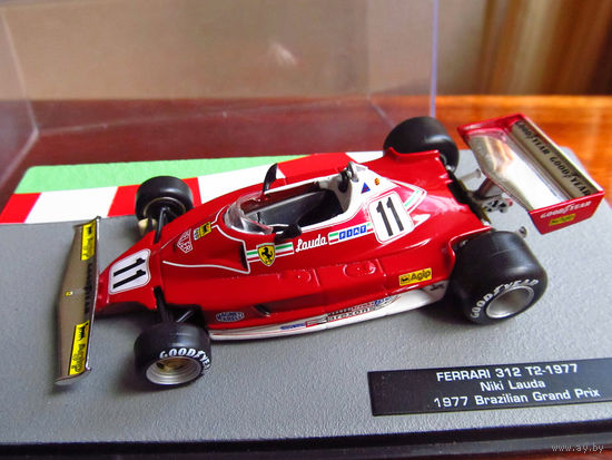Модель автомобиля 1-43 Фомула 1 Formula 1 F1 Ferrari 312 T2 1977 Niki Lauda 1977 Brazilian Grand Prix В комплекте модель, бокс, журнал Состояние модель как новая журнал отличное