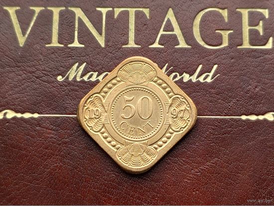 Нидерландские Антильские острова. 50 центов 1997 (позолоченная сталь). Торг.