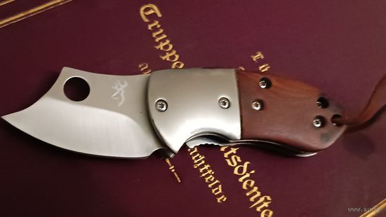 Нож брелок. Не точен, отличный брелок для ключей. Лезвие толстое и сам тяжеленький.