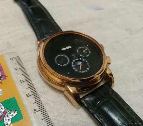 Наручные часы Patek Philippe Skeleton. На ходу. Механика. Заявлено-покрытие золотом 750* Календарь (день недели+месяц), восход/заход солнца-работают, родной кожаный ремешок, привезены из Швеции.