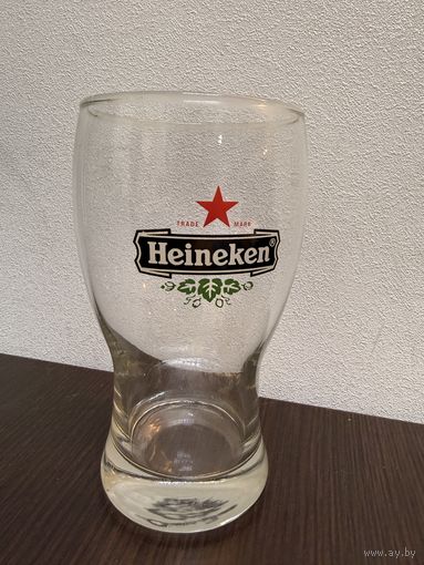 Классический пивной бокал объёмом 250 мл с фирменным логотипом Heineken.