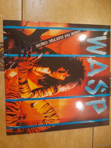 WASP " INSIDE THE ELECTRIC CIRCUS" 1986/?  reissue LP E.U. CAPITOL EST2025  MINT