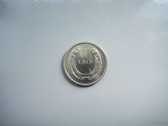 Латвия 1 лат 2010г. ПОДКОВА (к верху).