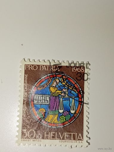 Марка Швейцария 1968 год Знак зодиака Весы (Libra), изображенный на основе витража собора Лозанны.