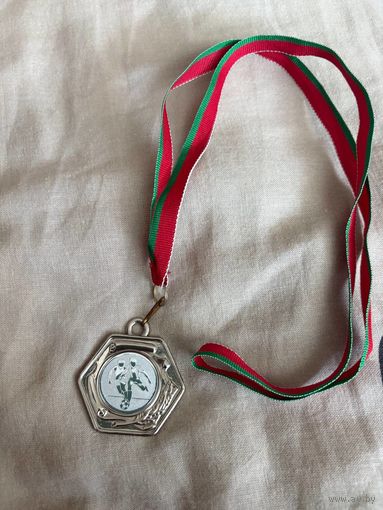 Медаль соревнования первомайского района по футболу "Кожаный мяч" ll место 2013 год