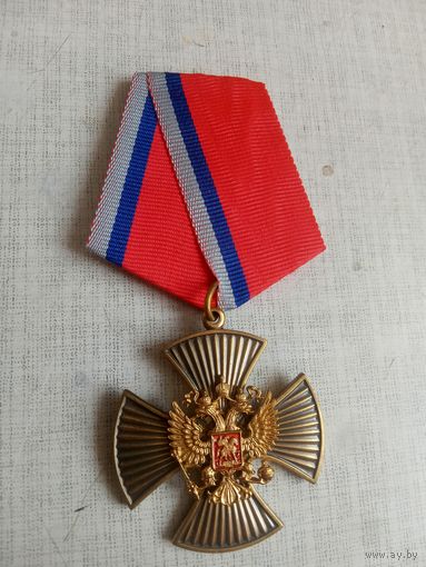 Медаль. Крест за заслуги.