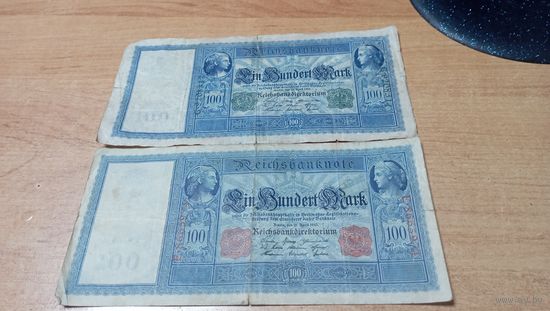 Две по 100 марок(флотские, с кораблям) 1910 года с зелёными и красными номерами и печатями