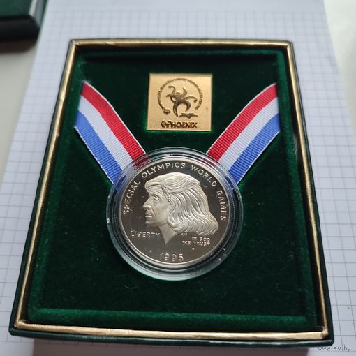 США 1 доллар 1995 года, в честь Всемирных летних спец.Олимпийских игр. Серебро 900 пр.