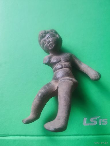 Старинная фигурка (фрагмент )