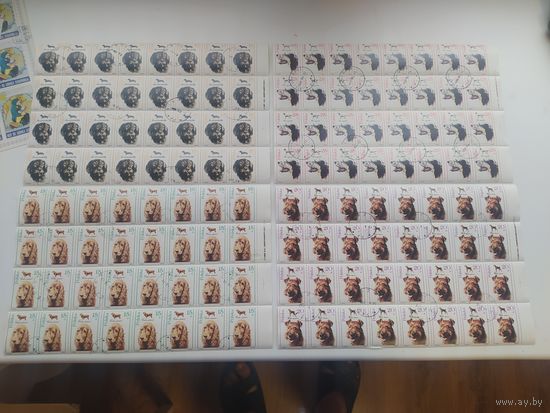 4 части листов 128 марок Собаки фауна Польша 1989 год  лот 1 возможна продажа частями листов,  штучно или квартами