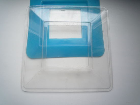 Подставка под выключатель (прозрачная на фоне синей)