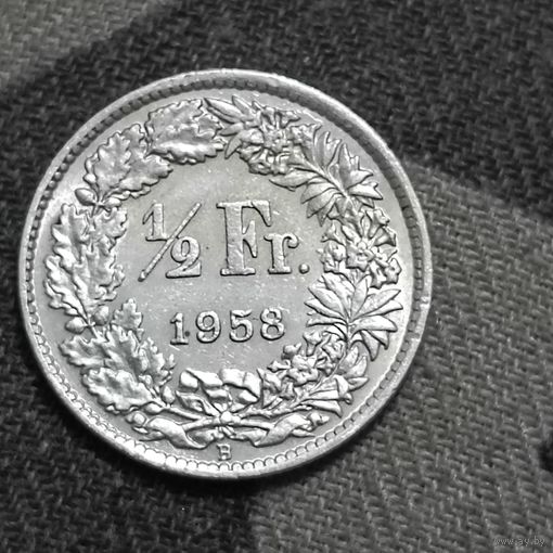 1/2франка(1958г.) Швейцария.Серебро.
