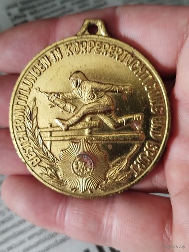 Крупная медаль ГДР,латунь,с рубля