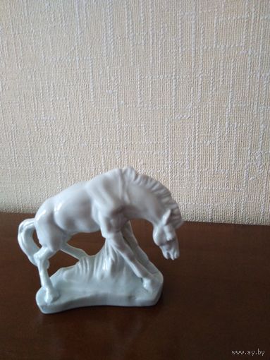 Конь