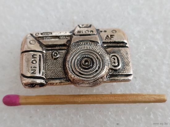 Знак. Фотоаппарат "Nion"