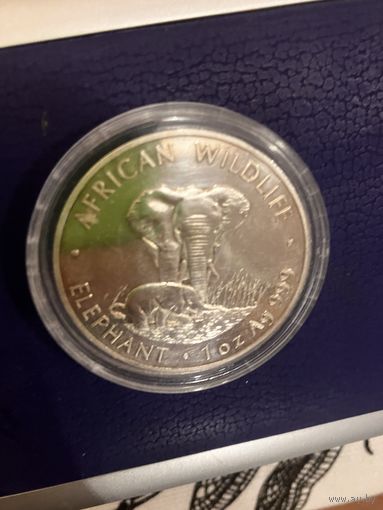 Серебро 999! Унция, монета Слоны Замбии