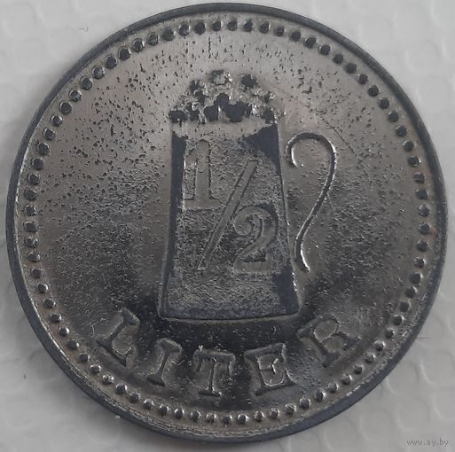 Довоенный немецкий пивной жетон.