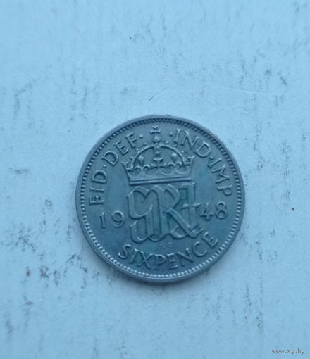 Великобритания 6 пенсов 1948 год с надписью IND: IMP: готические инициалы короля