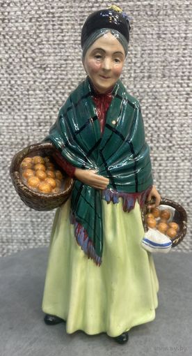 Фарфоровая статуэтка Продавец апельсинов. Royal Doulton. Англия. 1953 год. Высота 21 см