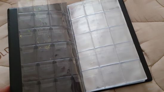 Комбинированный альбом для монет на 192 монеты.