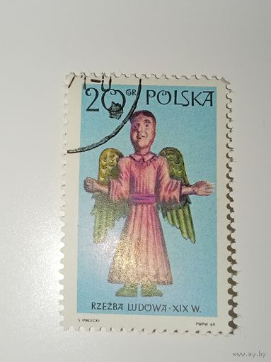 Польша 1969 с изображением деревянной народной скульптуры ангела XIX века.