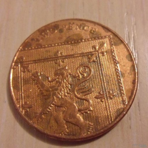 2 пенса Великобритания 2009 г.в. - Фрагмент герба Британской Королевской семьи.