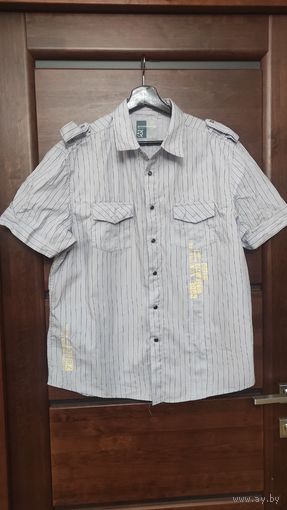 Стильная рубашка на 50-52 размер, хлопок, отличное состояние. Длина 73 см, ПОгруди 57 см, прямого фасона. Классная и легкая. Нежно-лилового цвета.