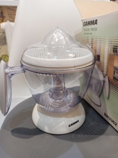 Электрическая соковыжималка для цитрусовых с обратным ходом