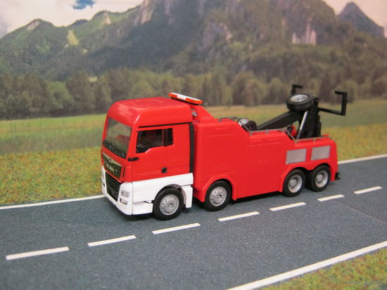 Грузовой эвакуатор MAN TG-X XLX HERPA. Масштаб НО 1:87.