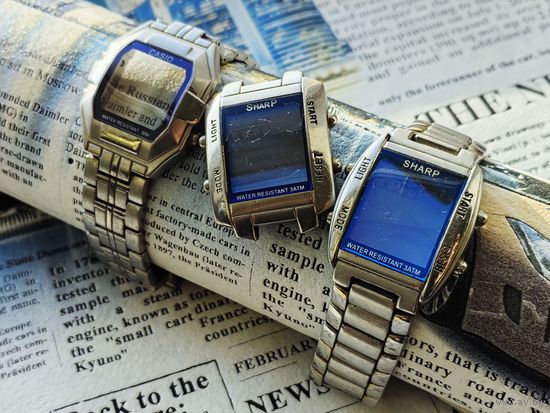 Корпус электронных наручных часов Casio с браслетом + 2-е часов Sharp.