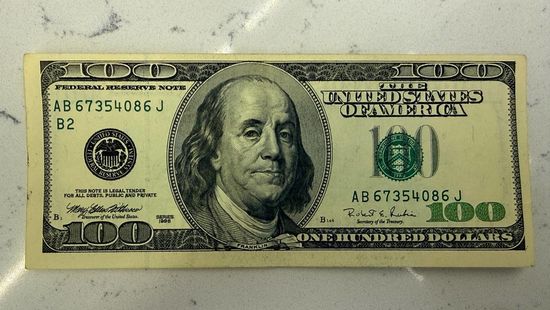 Заводской брак 100 долларов