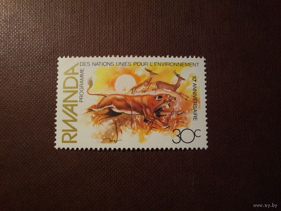 Руанда 1982 г.Антилопы импала и лев./23а/