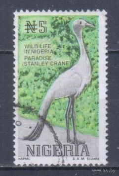 [1130] Нигерия 1993. Фауна.Птицы.Журавль. Гашеная марка.
