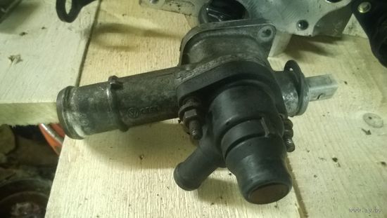 Корпус термостата 038 121 133J VW1,9 TDI AUY