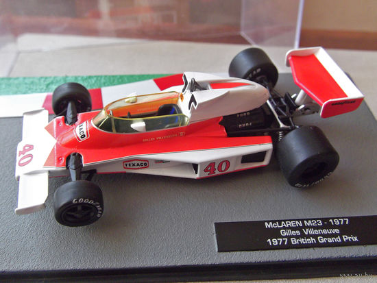 Модель автомобиля 1-43 Фомула 1 Formula 1 F1 McLaren M23 1977 Gilles Villeneuve 1977 British Grand Prix В комплекте модель, бокс, журнал Состояние модель как новая журнал отличное
