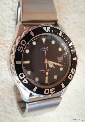 Часы Casio (кварц).