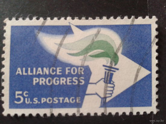 США 1963 эмблема, факел прогресса
