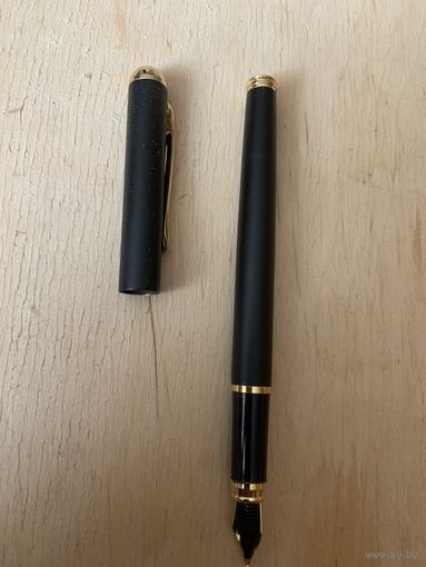 Чернильная ручка 2000-х годов. А может и раньше.