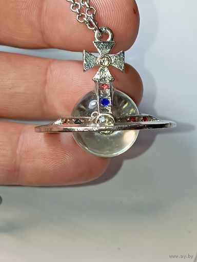 Маятник с кристаллом кварца . Очень красивый .