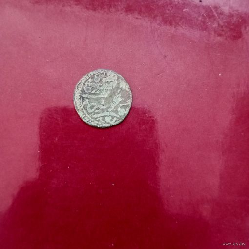 Старинная монета.