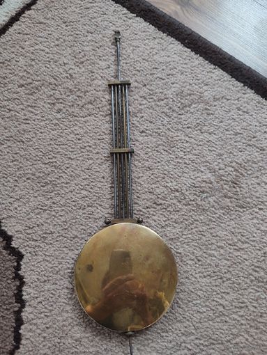 Маятник старинных часов